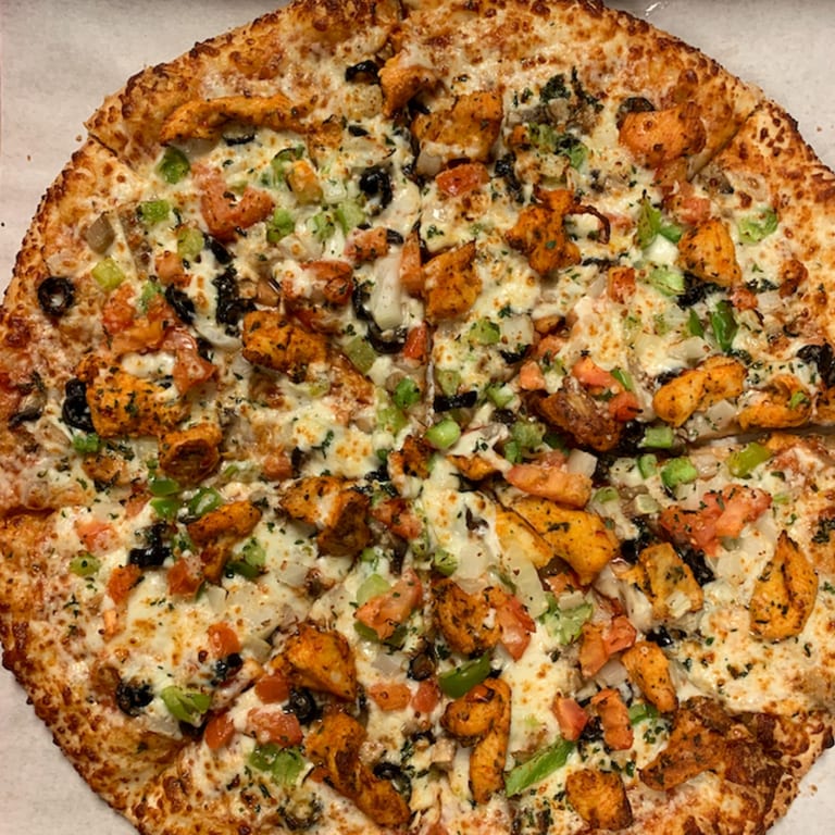 A Slice Above: Our Irresistible Specialty Pizzas